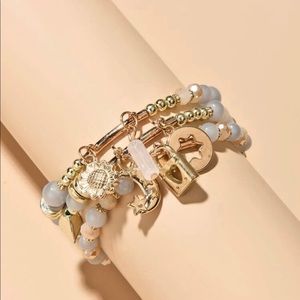 Lock charm beaded bracelet